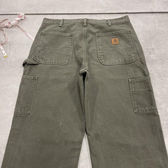 Green Carhartt carpenter jeans W34