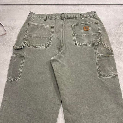 Green Carhartt carpenter jeans W34