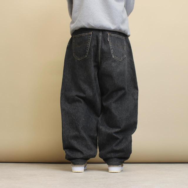 Faded black baggy skate jeans W36